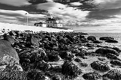 Low Tide at Watch Hill Light in Rhode Island -BW